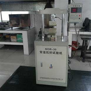 Compressive or flexural strength testing machine